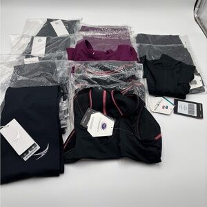 RESELLERS Bundle 17 pieces athletic wear NWT Msrp 1,186….. 5 leggings/ 12 tanks